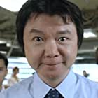 Wai Ai در نقش Chin Kwok-Fung