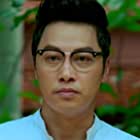 Patrick Tam در نقش Warden Sham Kwok-Keung
